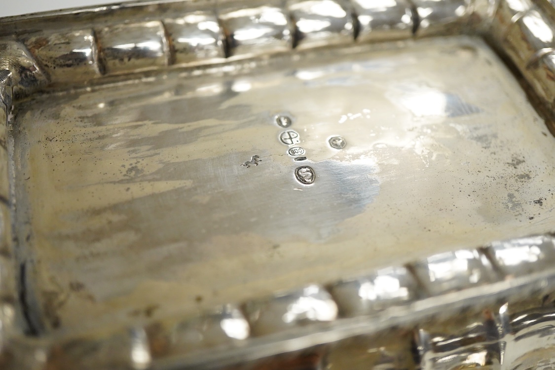 A continental 800 standard oblong shaped dish, of fluted design, together with a Peruvian sterling dish and similar pill box and a George V silver cigarette case, 16.6oz.
